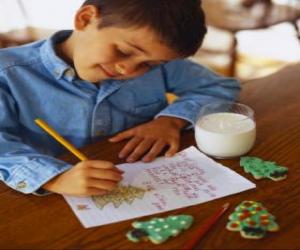 Puzzle Ένα παιδί γράφει ένα γράμμα στο Άγιο Βασίλη